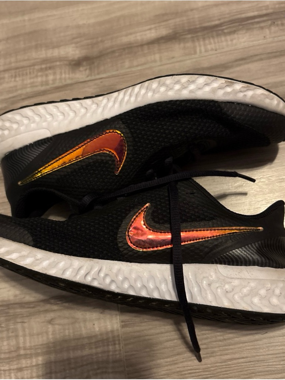 Nike Kids Black Sneakers with Iridescent Swoosh